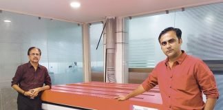 Bakul Darji and Ankit Darji with Dupont 2000 ECLF exposure system