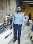 Hueman Graphics installs ES series folder-gluer from Robus India Hueman