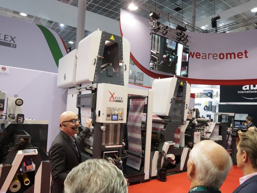 Omet X7, narrow web label press with the water-based rotogravure unit displayed at the Omet Stand at Labelexpo Europe 2022 in Brussels. Photo PSA