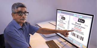 Rajesh Nema, Pragati’s executive director demonstrates the Baldwin OLP inspection system. Photo Pragati Graphics Indore
