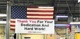 Banner thanking Mark Andy's employees was placed in the manufacturing building in Missouri, United States. Photo Mark Andy