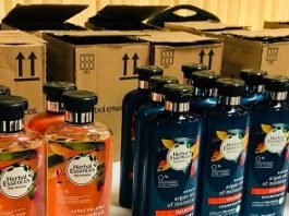 Domino shampoo and conditioner bottles with tactile-coded design