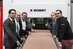 From left to right - Sacha Bourgeois (Bobst), Peter Witzig (Bobst), Luis Manuel Luis (Bourquin), Pierre Binggeli (Bobst), Iuri Goncalves (Bourquin) with bobst Speedpack machine