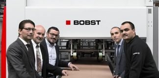 From left to right - Sacha Bourgeois (Bobst), Peter Witzig (Bobst), Luis Manuel Luis (Bourquin), Pierre Binggeli (Bobst), Iuri Goncalves (Bourquin) with bobst Speedpack machine
