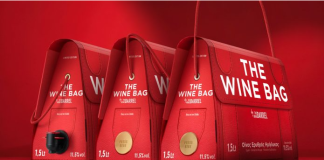 The Wine Bag (Greece) Company: AS Strategy, Branding & Communication The Wine Bag stood out at the WPO awards as a stunning triumph, blending elegance and innovation. This carton bag box for red wine is a masterpiece, meticulously crafted down to the finest details. Beyond its visual appeal, this project's essence lies in the ingenious concept of transforming a wine box into a fashionable and festive accessory