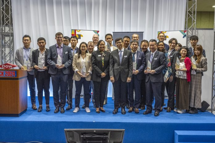 1. Winners of the 35th Packaging Innovation Awards present at Tokyo Pack, with Dow's Bambang Candra and Karen S Carter Dow