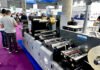 At Hall 4, Booth 4D22, Vinsak is showing its Label-Decore, an advanced modular label finishing machine designed for high-quality embellishments and flexible configurations. Attendees are witnessing live demonstrations of the Label-Decore in action, showcasing its capabilities in label converting, decoration, and premium finishing.