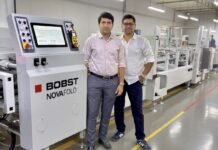 Vaibhav and Vishal Kothari of Integrity Packaging with Bobst Novafold folder gluer
