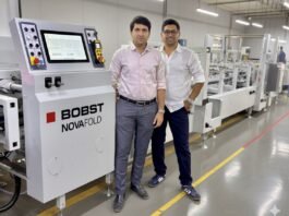 Vaibhav and Vishal Kothari of Integrity Packaging with Bobst Novafold folder gluer