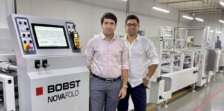 Vaibhav and Vishal Kothari of Integrity Packaging with Bobst Novafold folder gluer