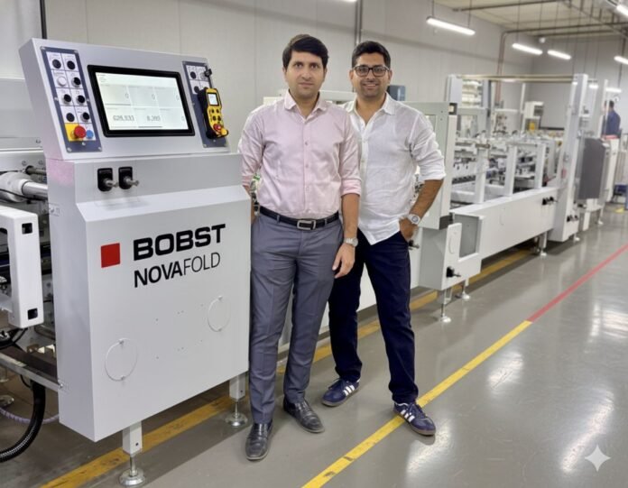 Vaibhav and Vishal Kothari of Integrity Packaging with Bobst Novafold folder gluer