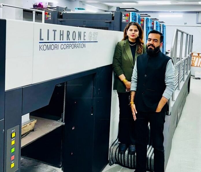 Mr. Aaryan Dhanwani and his wife Mrs. Richal A Manchhanda alongside KOMORI Lithrone G37 Darpan Printers