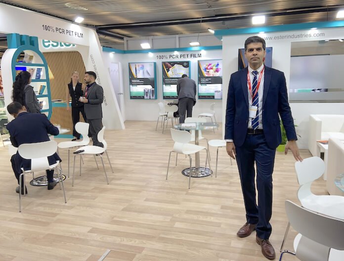 ester ceo vaibhav jha01EsterWEb700 CEO Vaibhav Jha of Ester Industries at the company's stand at Interpack 2026 Photo PSA