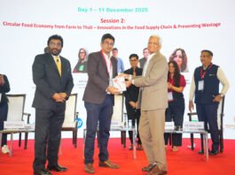 Vijay Sood presents a momento to Nitin Sanduja of Buhler India alongside the Intrapack exhibition at the first FoodTekPack Conference on 11 December 2025 at the Greater Noida Expo. Standing to their left is Ainan Shahidi. Behind them on the stage, from left to right, are Aditi Jhala, Bhushan Yengade, Himanshi Mahajan, and Sandeep Ghosh Photo PSA/IPAMA