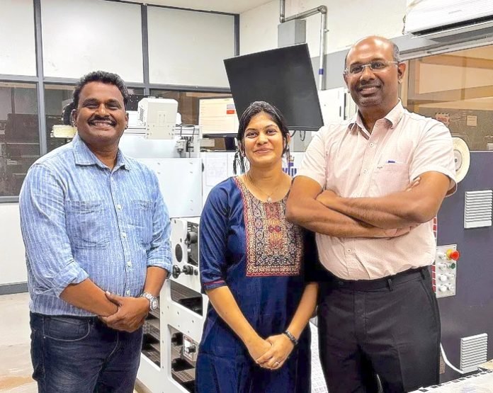 L-to-R-Mr.-Suresh-Murugesan-Regional-Director-South-India-Sri-Lanka-FIG_-Mrs.-Sheela-Gowri-Arun-and-Mr.-Arun-Tenzing-alongside-Rhyguan-SMART-450-with-Luster-LabelMaste (L to R) Suresh Murugesan, regional director - South India & Sri Lanka, FIG, Sheela Gowri Arun and Arun Tenzing alongside Rhyguan SMART-450 with Luster LabelMaster