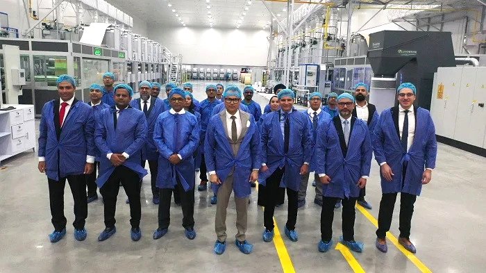 Ashwani Kumar Sharma (fourth from Left), president & CEO of the Aseptic Packaging Business at UFlex with his team at the Asepto Egypt facility. Photo UFlex